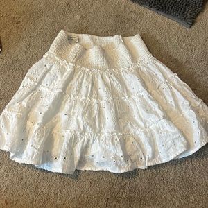 american eagle white, flowy skirt. has ruffles and is really cute.